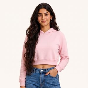 Aliza posing in Plain Light Baby Pink Female Cropped Hoodie by Polimemes India