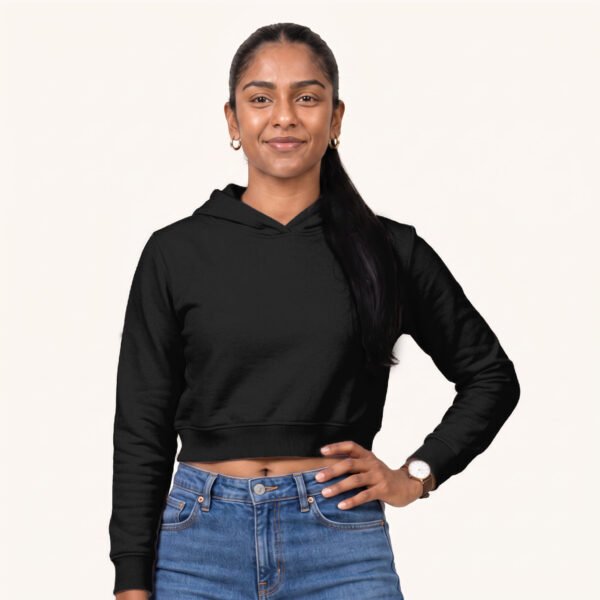 Tara posing in Plain Black Female Cropped Hoodie by Polimemes India