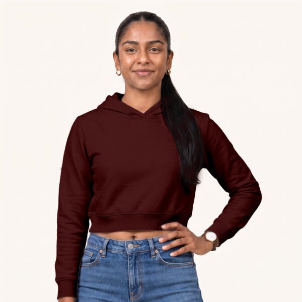 Tara posing in plain Maroon Female Cropped Hoodie by Polimemes India