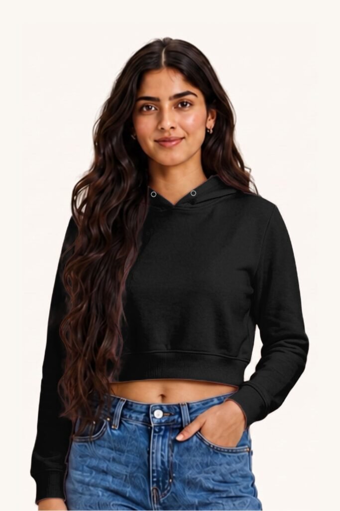 Aliza posing in plain black cropped hoodie by Polimemes India